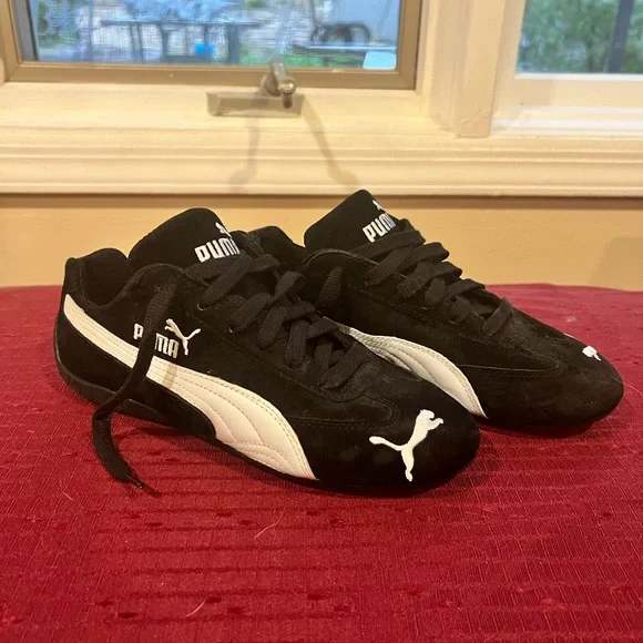 Speed Cat Red And Black Pumas Onesie Dua Lipa Gives Wild Twist To